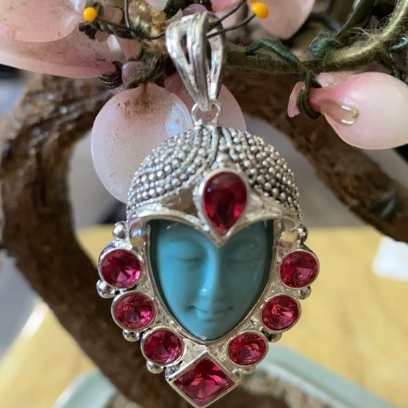 Vintage Jewelry - Vintage 925 collectible goddess garnet pendent